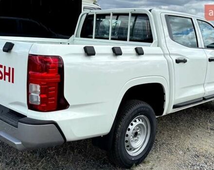 Белый Мицубиси Л 200, объемом двигателя 2.5 л и пробегом 1 тыс. км за 28962 $, фото 2 на Automoto.ua