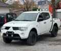Білий Міцубісі Л 200, об'ємом двигуна 2.5 л та пробігом 234 тис. км за 4300 $, фото 1 на Automoto.ua