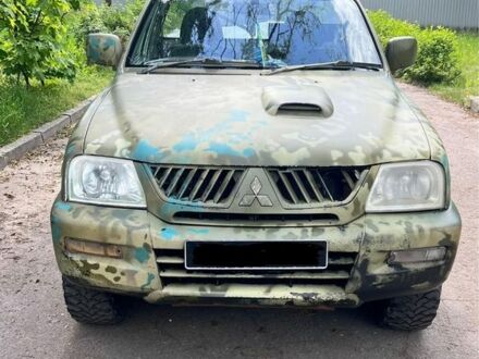 Белый Мицубиси Л 200, объемом двигателя 2.5 л и пробегом 3 тыс. км за 4700 $, фото 1 на Automoto.ua