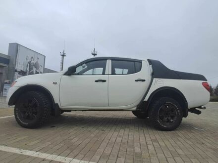 Белый Мицубиси Л 200, объемом двигателя 2.5 л и пробегом 178 тыс. км за 5000 $, фото 1 на Automoto.ua