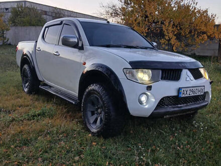 Мицубиси Л 200 2008 в Краснокутске на Automoto.ua Белый Мицубиси Л 200, объемом двигателя 2.48 л и пробегом 360 тыс. км за 11300 $, фото 1 на Automoto.ua