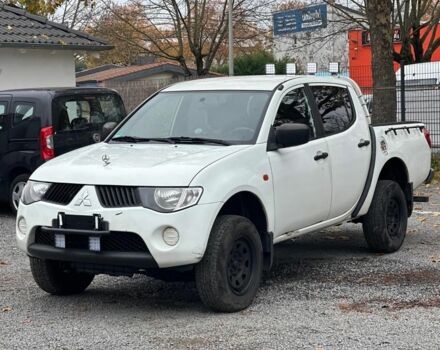 Білий Міцубісі Л 200, об'ємом двигуна 2.5 л та пробігом 234 тис. км за 2705 $, фото 1 на Automoto.ua