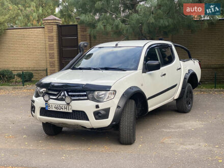 Мицубиси Л 200 2012 в Харькове на Automoto.ua Белый Мицубиси Л 200, объемом двигателя 2.48 л и пробегом 169 тыс. км за 15000 $, фото 1 на Automoto.ua