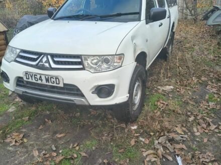 Белый Мицубиси Л 200, объемом двигателя 2.5 л и пробегом 134 тыс. км за 7200 $, фото 1 на Automoto.ua