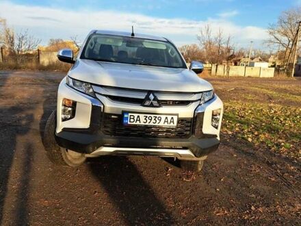 Білий Міцубісі Л 200, об'ємом двигуна 2.44 л та пробігом 56 тис. км за 28800 $, фото 1 на Automoto.ua