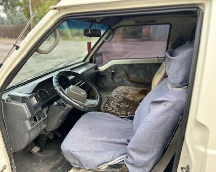 Бежевый Мицубиси Л 200, объемом двигателя 2.5 л и пробегом 400 тыс. км за 2800 $, фото 11 на Automoto.ua