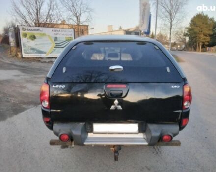 Чорний Міцубісі Л 200, об'ємом двигуна 2.5 л та пробігом 220 тис. км за 129000 $, фото 5 на Automoto.ua
