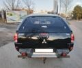 Чорний Міцубісі Л 200, об'ємом двигуна 2.5 л та пробігом 220 тис. км за 129000 $, фото 5 на Automoto.ua