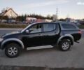 Чорний Міцубісі Л 200, об'ємом двигуна 2.5 л та пробігом 220 тис. км за 129000 $, фото 1 на Automoto.ua
