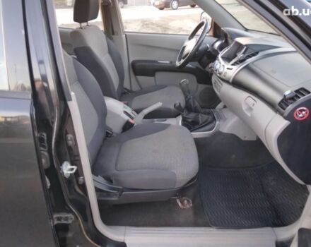 Чорний Міцубісі Л 200, об'ємом двигуна 2.5 л та пробігом 220 тис. км за 129000 $, фото 4 на Automoto.ua