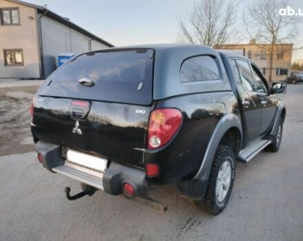 Чорний Міцубісі Л 200, об'ємом двигуна 2.5 л та пробігом 220 тис. км за 129000 $, фото 1 на Automoto.ua
