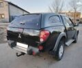 Чорний Міцубісі Л 200, об'ємом двигуна 2.5 л та пробігом 220 тис. км за 129000 $, фото 1 на Automoto.ua