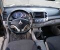 Чорний Міцубісі Л 200, об'ємом двигуна 2.5 л та пробігом 220 тис. км за 129000 $, фото 3 на Automoto.ua