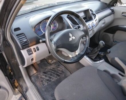 Чорний Міцубісі Л 200, об'ємом двигуна 2.5 л та пробігом 220 тис. км за 129000 $, фото 13 на Automoto.ua