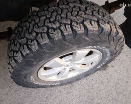 Чорний Міцубісі Л 200, об'ємом двигуна 2.5 л та пробігом 220 тис. км за 129000 $, фото 7 на Automoto.ua