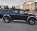 Чорний Міцубісі Л 200, об'ємом двигуна 2.5 л та пробігом 220 тис. км за 129000 $, фото 2 на Automoto.ua