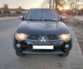 Чорний Міцубісі Л 200, об'ємом двигуна 2.5 л та пробігом 220 тис. км за 129000 $, фото 6 на Automoto.ua
