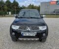 Черный Мицубиси Л 200, объемом двигателя 2.5 л и пробегом 245 тыс. км за 3200 $, фото 6 на Automoto.ua