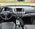 Черный Мицубиси Л 200, объемом двигателя 2.5 л и пробегом 245 тыс. км за 3200 $, фото 3 на Automoto.ua