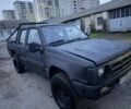 Черный Мицубиси Л 200, объемом двигателя 2.5 л и пробегом 310 тыс. км за 2700 $, фото 1 на Automoto.ua