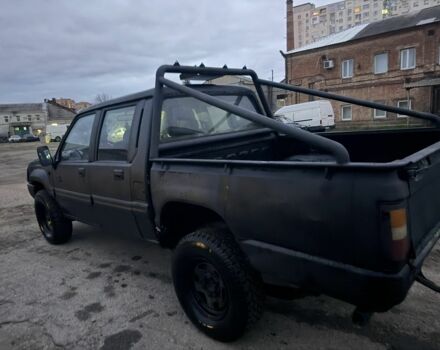 Черный Мицубиси Л 200, объемом двигателя 2.5 л и пробегом 310 тыс. км за 2700 $, фото 4 на Automoto.ua
