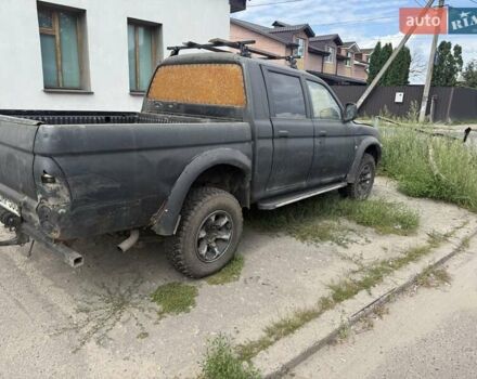 Черный Мицубиси Л 200, объемом двигателя 2.5 л и пробегом 250 тыс. км за 2500 $, фото 3 на Automoto.ua