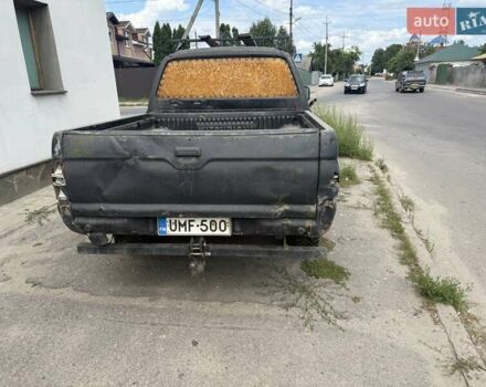 Черный Мицубиси Л 200, объемом двигателя 2.5 л и пробегом 250 тыс. км за 2500 $, фото 4 на Automoto.ua