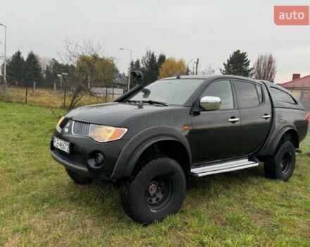 Черный Мицубиси Л 200, объемом двигателя 2.5 л и пробегом 236 тыс. км за 3700 $, фото 1 на Automoto.ua