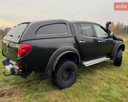 Черный Мицубиси Л 200, объемом двигателя 2.5 л и пробегом 236 тыс. км за 3700 $, фото 6 на Automoto.ua