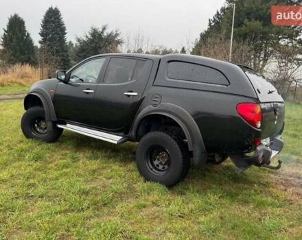 Черный Мицубиси Л 200, объемом двигателя 2.5 л и пробегом 236 тыс. км за 3700 $, фото 4 на Automoto.ua