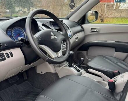 Черный Мицубиси Л 200, объемом двигателя 2.5 л и пробегом 236 тыс. км за 3700 $, фото 8 на Automoto.ua