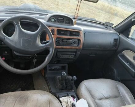 Чорний Міцубісі Л 200, об'ємом двигуна 0 л та пробігом 310 тис. км за 1802 $, фото 3 на Automoto.ua