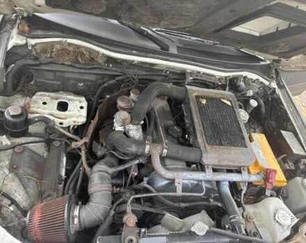 Чорний Міцубісі Л 200, об'ємом двигуна 2.5 л та пробігом 220 тис. км за 5600 $, фото 6 на Automoto.ua