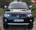 Черный Мицубиси Л 200, объемом двигателя 2.48 л и пробегом 197 тыс. км за 3902 $, фото 1 на Automoto.ua