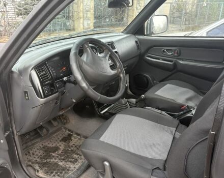 Чорний Міцубісі Л 200, об'ємом двигуна 2.5 л та пробігом 220 тис. км за 5600 $, фото 1 на Automoto.ua