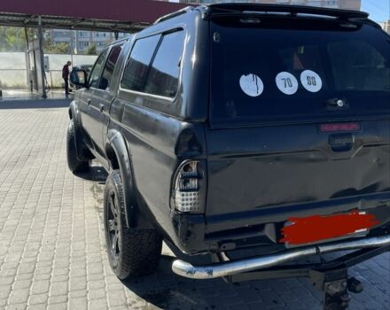 Черный Мицубиси Л 200, объемом двигателя 2.5 л и пробегом 220 тыс. км за 5299 $, фото 5 на Automoto.ua