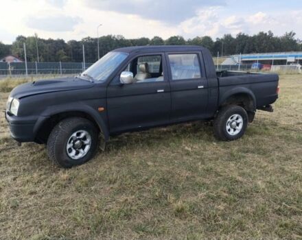 Чорний Міцубісі Л 200, об'ємом двигуна 0 л та пробігом 310 тис. км за 1802 $, фото 1 на Automoto.ua