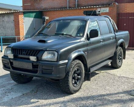 Чорний Міцубісі Л 200, об'ємом двигуна 2.5 л та пробігом 250 тис. км за 4800 $, фото 2 на Automoto.ua
