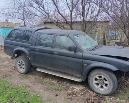 Черный Мицубиси Л 200, объемом двигателя 2.5 л и пробегом 500 тыс. км за 2611 $, фото 1 на Automoto.ua