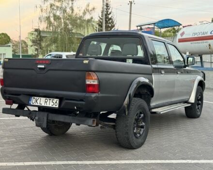 Чорний Міцубісі Л 200, об'ємом двигуна 0.25 л та пробігом 324 тис. км за 5850 $, фото 7 на Automoto.ua