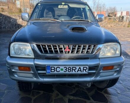 Черный Мицубиси Л 200, объемом двигателя 0 л и пробегом 225 тыс. км за 5205 $, фото 1 на Automoto.ua