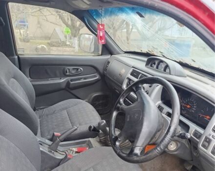 Черный Мицубиси Л 200, объемом двигателя 2.5 л и пробегом 500 тыс. км за 2611 $, фото 4 на Automoto.ua