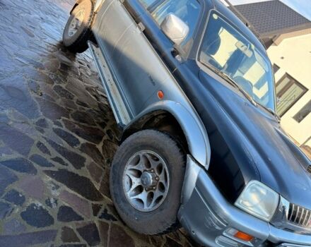 Черный Мицубиси Л 200, объемом двигателя 0 л и пробегом 225 тыс. км за 5205 $, фото 2 на Automoto.ua