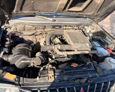 Черный Мицубиси Л 200, объемом двигателя 0 л и пробегом 225 тыс. км за 5205 $, фото 6 на Automoto.ua