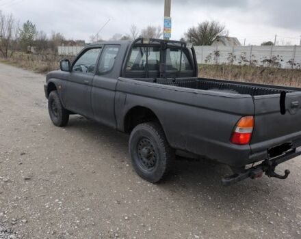 Черный Мицубиси Л 200, объемом двигателя 2.5 л и пробегом 220 тыс. км за 4500 $, фото 3 на Automoto.ua