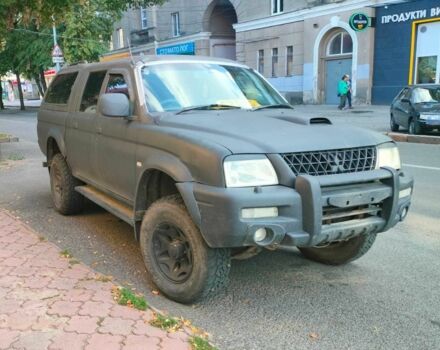 Чорний Міцубісі Л 200, об'ємом двигуна 2.5 л та пробігом 238 тис. км за 4500 $, фото 1 на Automoto.ua