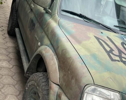 Мицубиси Л 200 2002 в Покровском на Automoto.ua Черный Мицубиси Л 200, объемом двигателя 2.5 л и пробегом 400 тыс. км за 5000 $, фото 7 на Automoto.ua