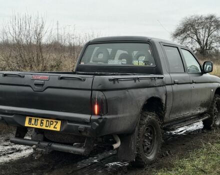 Черный Мицубиси Л 200, объемом двигателя 0 л и пробегом 232 тыс. км за 4100 $, фото 3 на Automoto.ua