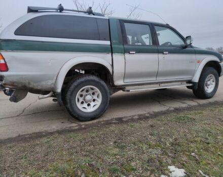 Черный Мицубиси Л 200, объемом двигателя 2.5 л и пробегом 120 тыс. км за 5500 $, фото 9 на Automoto.ua