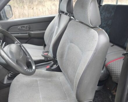 Черный Мицубиси Л 200, объемом двигателя 2.5 л и пробегом 220 тыс. км за 4500 $, фото 13 на Automoto.ua